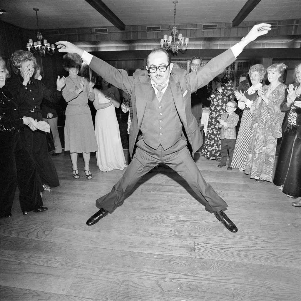 Meryl Meisler, Man in a 3 Piece Suit Dancing Within the Circle at a Wedding Rockville Centre, NY March 1976